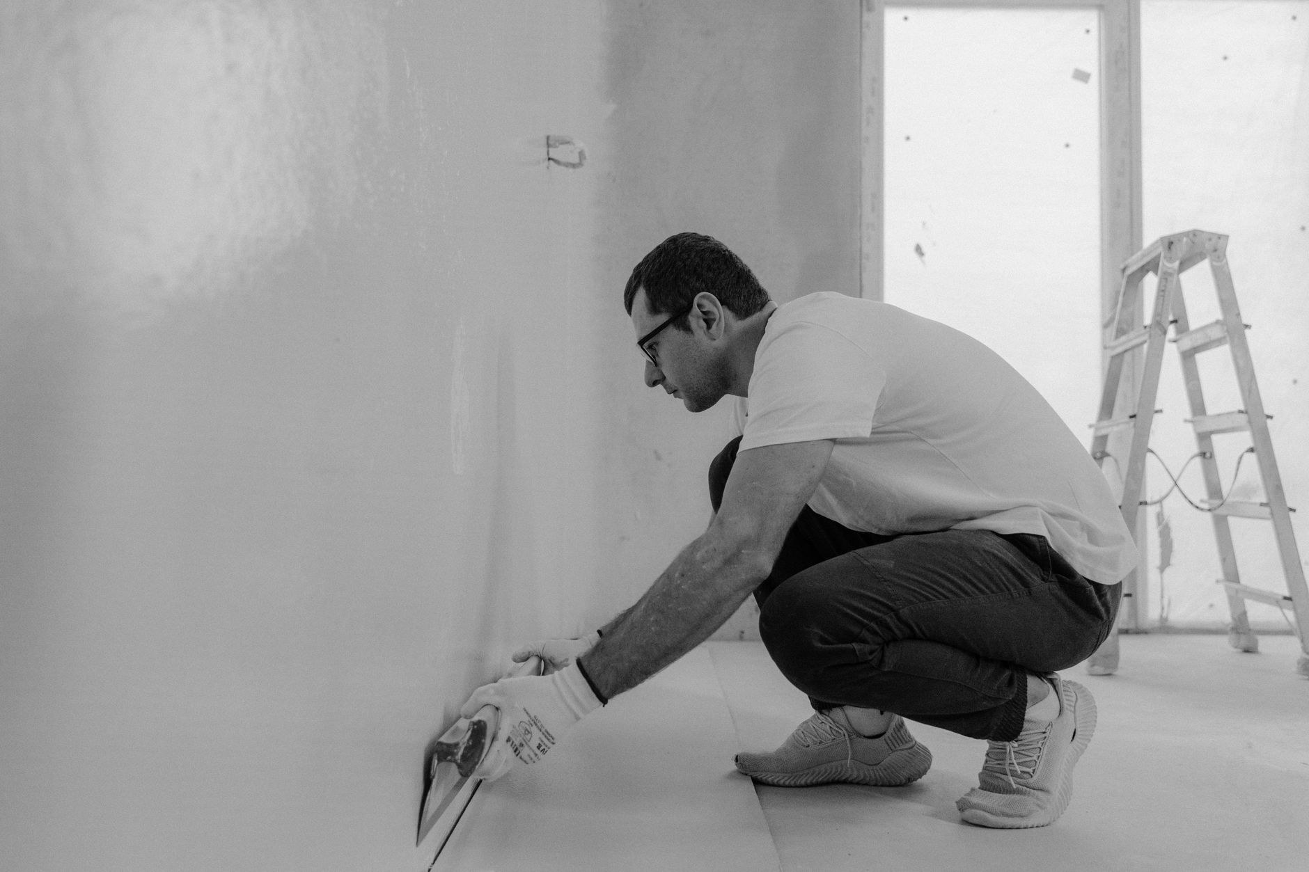Plastering work in progress on an interior wall